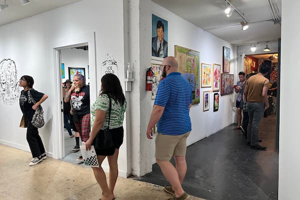 First Friday Art Walk monthly celebration with open galleries, artist receptions, live music, and street performances